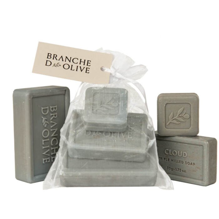 Branche d'Olive Cloud Soap Steps, three sizes of soap stepped on each other bagged and tagged with display Cloud Soap as a backdrop