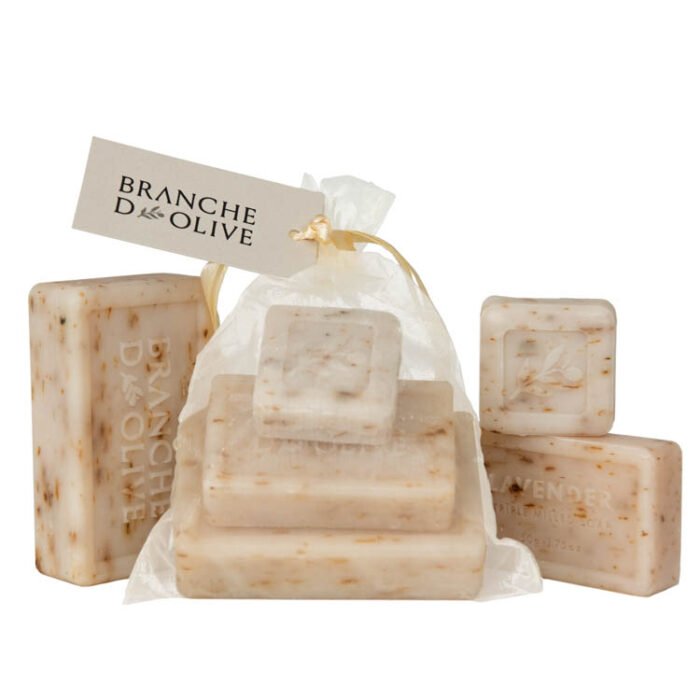 Branche d'Olive White Lavender with Plant Soap Steps, three sizes of soap stepped on each other bagged and tagged with display White Lavender with Plant Soap as a backdrop