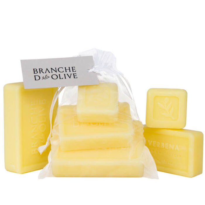 Branche d'Olive Verbena Soap Steps, three sizes of soap stepped on each other bagged and tagged with display Verbena Soap as a backdrop