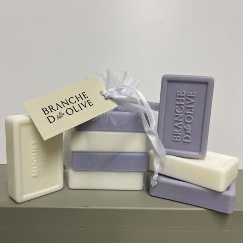 Branche d'Olive's white Lily of the Valley and mauve Lavender 50g soaps shown bagged in white voile and tagged with unbagged soaps also shown