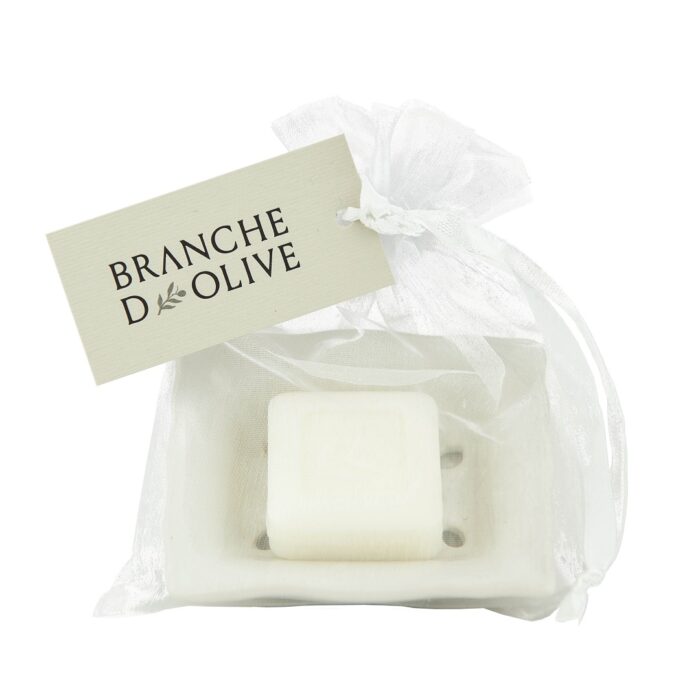 Bagged in white voile with a Branche d'Olive hanging tag, a white ceramic soap dish with a white Muguet (Lily of the Valley) soap