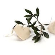 Branche d'Olive heart shaped ceramic heart with satin ribbon pictured with an olive branch