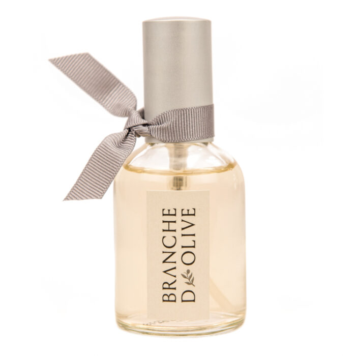 Branch d'Olive Feather Pillow Mist in a glass bottle with silver lid and a grey ribbon tie shown against a white back ground