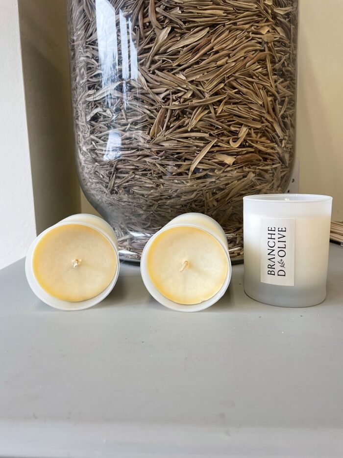 Branche D'Olive ex display Verbena candles shown with two sample candles on their sides next to one candle shown upright. All are unboxed