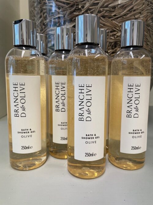 Branche d'Olive Bath/Shower Lotion in pre-rebrand packaging with clear bottles and chrome flip lids with new branding labels