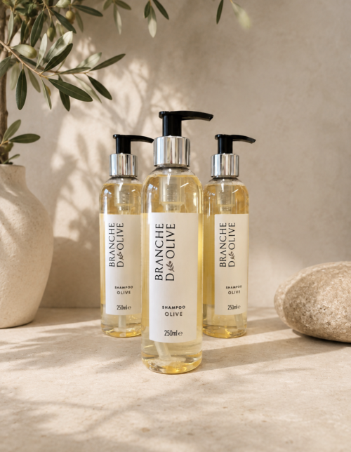 Branche d'Olive Shampoo with chrome pumps pictured beside Olive branches